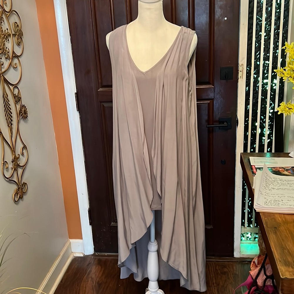 Tunic top with sleeveless cape